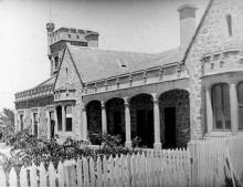 A black and white photograph of the stone-masonry front of St Francis House.